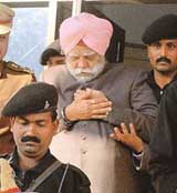 Bihar Governor Buta Singh comes out of Bihar Nivas in New Delhi on Tuesday