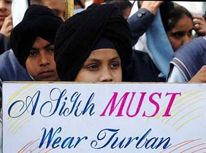 Schoolchildren at a protest march organised by the Shiromani Akali Dal (Panthak) demanding that the Sikhs should be allowed to wear turban in France, in New Delhi on Monday, while French President, Jacques Chirac, is on a three-day visit to India