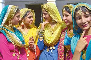 Students of the gidha team wait for their turn at the annual function at NTC School, Rajpura, on Tuesday.