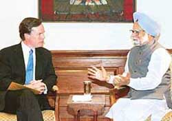 Prime Minister Manmohan Singh talks to US Undersecretary of State Nicholas Burns during a meeting in New Delhi on Thursday. 