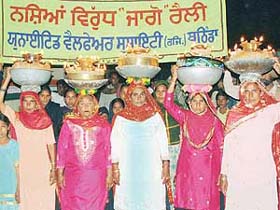 Rural women hold a ‘Jaago’ procession to sensitise people on the drug menace at a Bathinda village