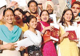 Students of Government College, Sector 11, Chandigarh, in a jubiliant mood after receiving their prizes at the annual prize-distribution function