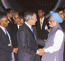 Prime Minister Manmohan Singh welcomes US President George W. Bush at Palam Air Force Station in New Delhi on Wednesday. 