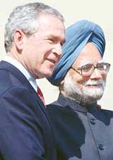 US President George W. Bush and Prime Minister Manmohan Singh are all smiles after addressing a press conference at Hyderabad House in New Delhi on Thursday