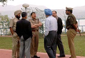 Senior officials from Punjab and Himachal Pradesh discuss the situation arising out of the Nangal and Bilaspur truck union dispute at Nehru Sadan Rest House, Nangal