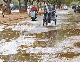 A view of Madhya Marg after early morning rain on Tuesday.