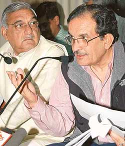 Mr Birender Singh, Finance Minister, Haryana, and Chief Minister Bhupinder Singh Hooda at a Press conference after presenting the Budget at Haryana Vidhan Sabha in Chandigarh on Friday