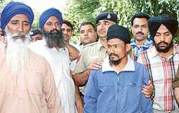 The four alleged Babbar Khalsa terrorists arrested by the Chandigarh Police being produced in a court in Chandigarh on Tuesday.