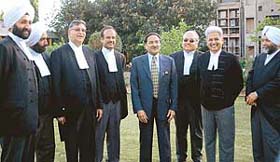 The seven new Judges of the Punjab and Haryana High Court are all smiles after the oath taking ceremony in Chandigarh