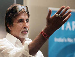 Bollywood star Amitabh Bachchan reacts during an event organised by International Indian Film Academy