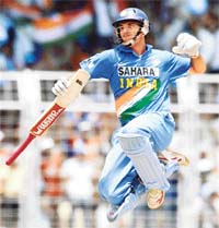 Man of the match Yuvraj Singh, who scored a whopping 103 runs off 76 deliveries, jumps in the air on completing his century during the third ODI against England in Margaon on Monday