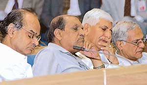 Secrateries taking a nap during Prime Minister Manmohan Singhs speech during the Civil Service Day function at Vigyan Bhavan in New Delhi on Friday.