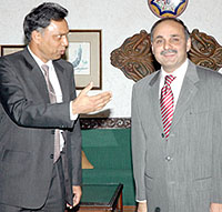 Mr Syed Ibne Abbas, Director-General (South Asia), from Pakistan with Mr Dilip Sinha, Joint Secretary, from India just before the start of delegation-level talks in New Delhi on Tuesday. 