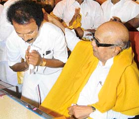 Mr M.K. Stalin takes the blessings of his father M. Karunanidhi at the secretariat following the swearing-in ceremony, in Chennai