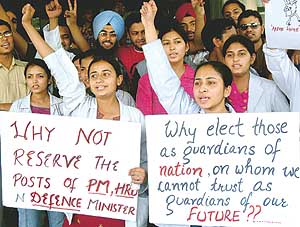 Students of Government Medical College stage a demonstration against proposed reservation policy in Amritsar on Saturday.