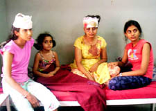 Some of the injured persons at the Civil Hospital in Sundernagar after a bus fell into a nullah at Jarol, 30 km from Mandi, on Wednesday