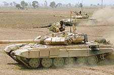The Armys T-90 tanks move on a field during an Army exercise on the outskirts of Jagraon in Ludhiana on Friday