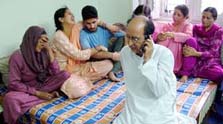 Wailing family members of Hitender Singh, who was shot dead in the USA on May 25, at their residence in Mandi on Saturday