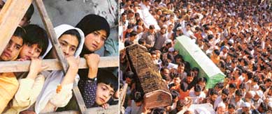 Children look down towards the procession at Handwara and  hundreds take part in the funeral procession on Wednesday of the schoolchildren killed in the naval boat capsize in Wular Lake, 82 km from Srinagar, on Tuesday