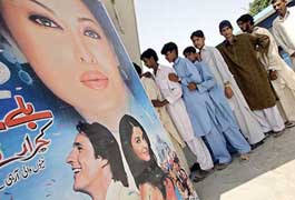 Pakistani people line up to buy tickets for Indian film star Aishwarya Rai's film Bride & Prejudice at a cinema in Rawalpindi on Friday.