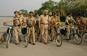 Policemen with new bicycles and other life-saving equipment at the Sukhna Lake on Saturday.