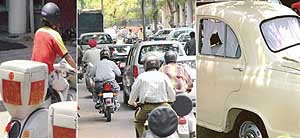 Scooters with heat entrapment boxes flouting the MV Act and curtained "VIP" cars move freely on city roads.