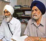 Brothers-in-arm! Major Gurdit Singh (retd) and his cousin, Major Narinder Singh Jallo (retd), in Chandigarh on Sunday.