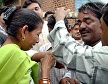 Family members of the accused in the Akshardham Temple attack case console each other outside Sabarmati Jail after a POTA court found five of the accused guilty in Ahmedabad on Saturday.