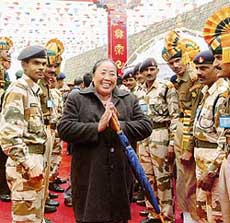 A Tibetan trader smiles after crossing into India through the border post at Nathu la, between Tibet and the northeastern state of Sikkim, on Thursday. 