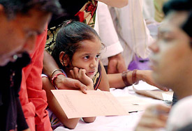 A young patient eagerly watches the process during the parallel OPD organised by the striking doctors at AIIMS campus,