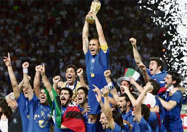 Members of the Italian team celebrate after winning the World Cup final against France