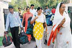 Members of the families of Kargil war martyrs in Jammu on Sunday before they leave for Kargil to participate in sarva dharam pooja in the Drass sector of Jammu and Kashmir to be held from July 18 to 26. 