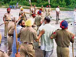 The police resorts to a lathicharge on truck operators in Ropar on Friday.