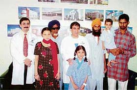 Dr Arvind Sharma, senior consultant, Opthalmology and Dr T.S Mahant, Executive Director, Cardio Thoracic and Vascular Surgery, with underprivileged patients at Fortis Hospital in Mohali