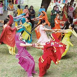 Students of Home Science College, Ludhiana, take part in the kikli competition during the Teej celebrations in the college