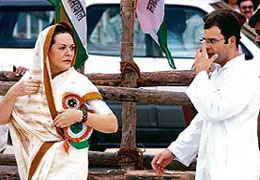 Congress President Sonia Gandhi and her son and party MP Rahul Gandhi arrive to attend a party rally in Kanpur on Tuesday.