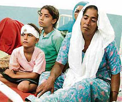 A grief-stricken Kiranjit Kaur, whose son was feared drowned when a truck plunged into a canal at Rara Sahib, near Ludhiana, on Tuesday.