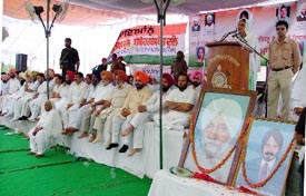 Deputy Chief Minister Rajinder Kaur Bhattal addresses a conference at Isru in Ludhiana on Tuesday.