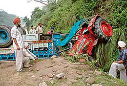 The tractor-trailer that fell into a gorge at Kiratpur Sahib on Wednesday.