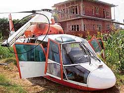 The helicopter carrying Chief Minister Amarinder Singh lies in a maize field after crash-landing at Bahadur Rajoa village in Sri Hargobindpur area of Gurdaspur on Tuesday. The broken rotor blade of the chopper is encircled.