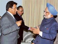 Prime Minister Manmohan Singh and Pakistan President Pervez Musharraf having a word after a bilateral meeting during the 14th Nonaligned Summit in Havana, Cuba, on Saturday