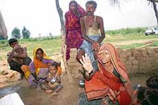 Ram Asre and his family, who work in a kiln in Beedru village, lament about the poor working conditions at brick kilns. 