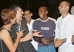 Dhillons share a laugh with the cricketers from Sri Lanka