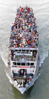 An overcrowded ferry leaves Dhaka terminal with homebound Bangladeshis ahead of Id on Sunday