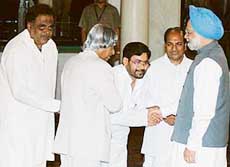 Newly appointed Union Ministers M.H. Ambareesh (left), Jai Prakash Yadav and A.K. Antony are greeted by President A.P.J. Abdul Kalam and Prime Minister Manmohan Singh after the oath-taking ceremony at Rashtrapati Bhavan in New Delhi on Tuesday. 