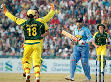 Virender Sehwag walks back to the pavilion after being dismissed in the Champions Trophy match against Australia at the PCA Stadium in Mohali on Sunday