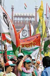 Jan Morcha, CPI and NCP activists demonstrate against the MCDs sealing drive in New Delhi on Thursday.
