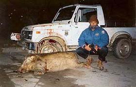 Yadvinder Singh Pirzada poses with a wild boar killed in Ropar and brought in his Gypsy to his house in Chandigarh