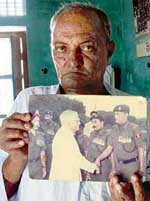 Hony Capt Om Prakash with a picture showing him with former President R. Venkataraman
