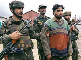 Gulam Nabi Mir of Pulwama, accused of lobbing a hand grenade outside a mosque, being produced before mediapersons in Srinagar
